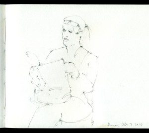 A drawing of a woman holding something in her hands.