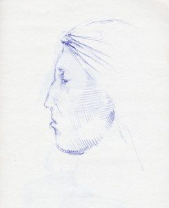 A drawing of an indian head in profile.