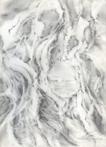 A white marble surface with some grey and black lines